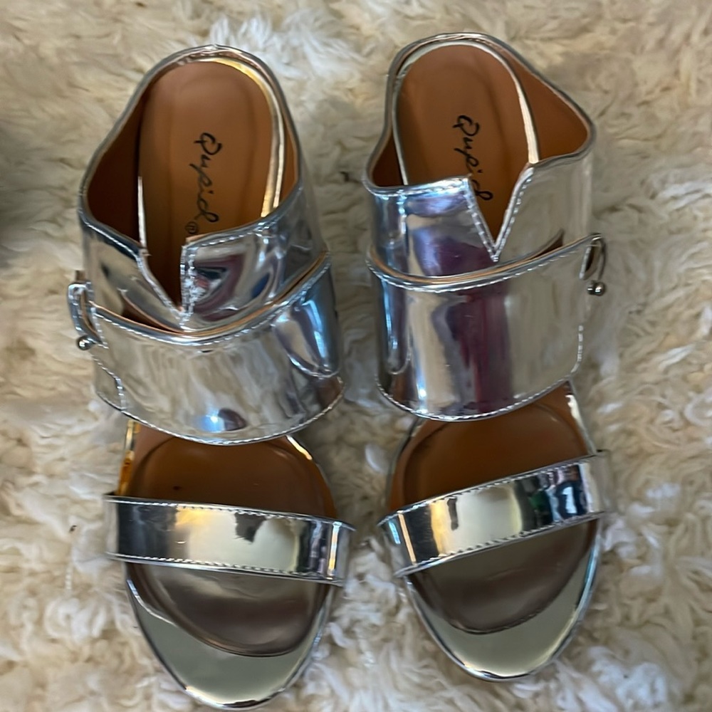 Silver mirror heels.